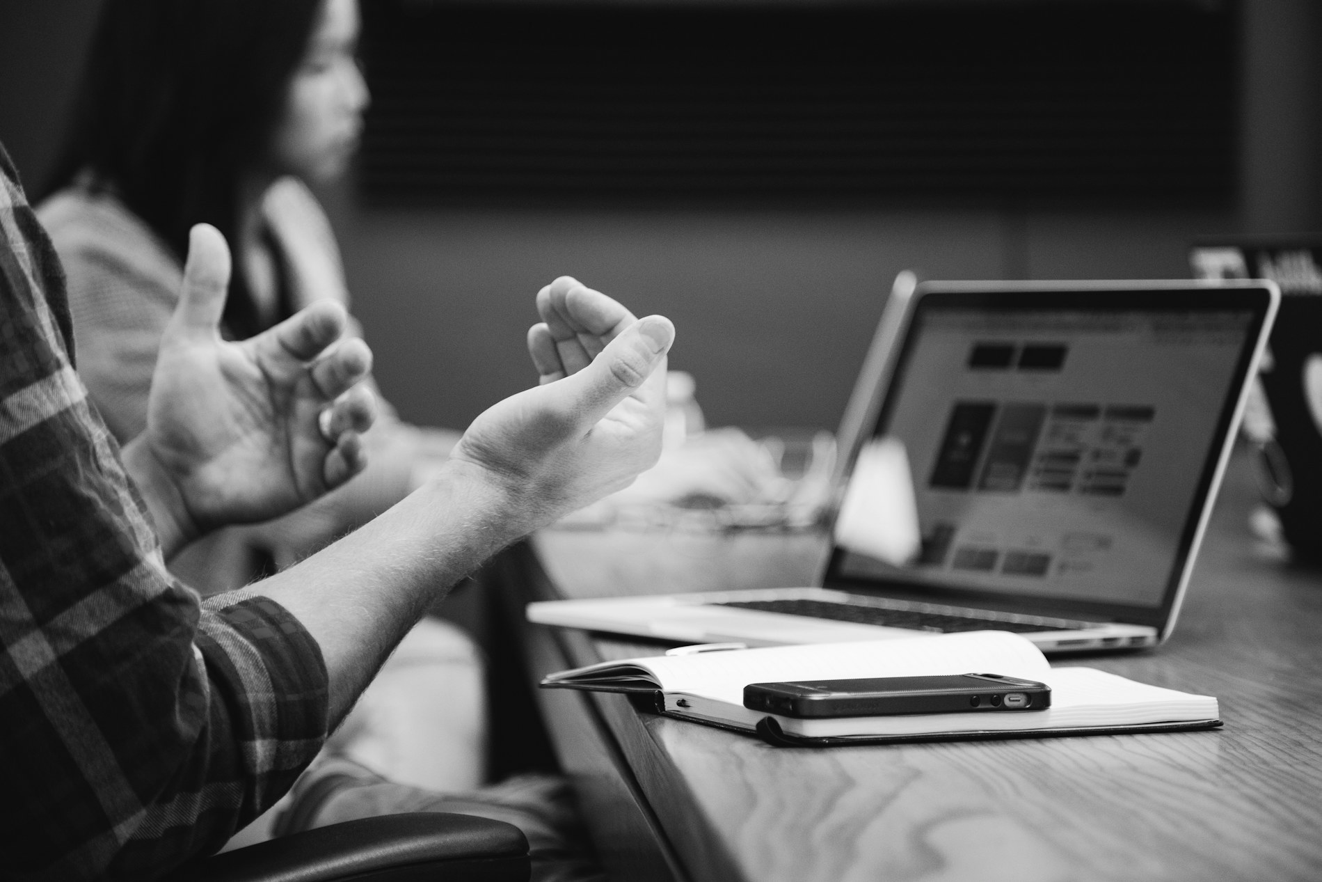 Someone explaining an idea in a meeting